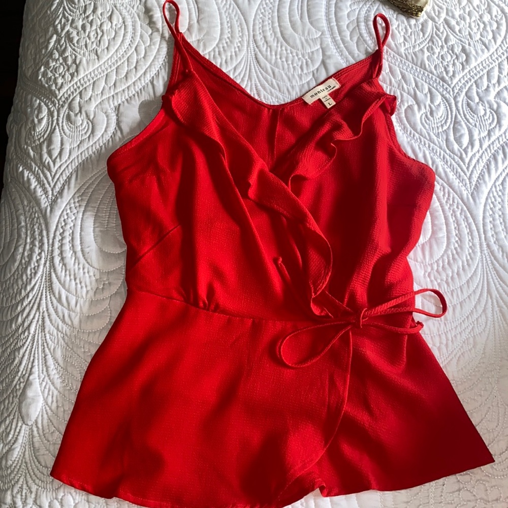 Red ruffled tank top with a tie on the side